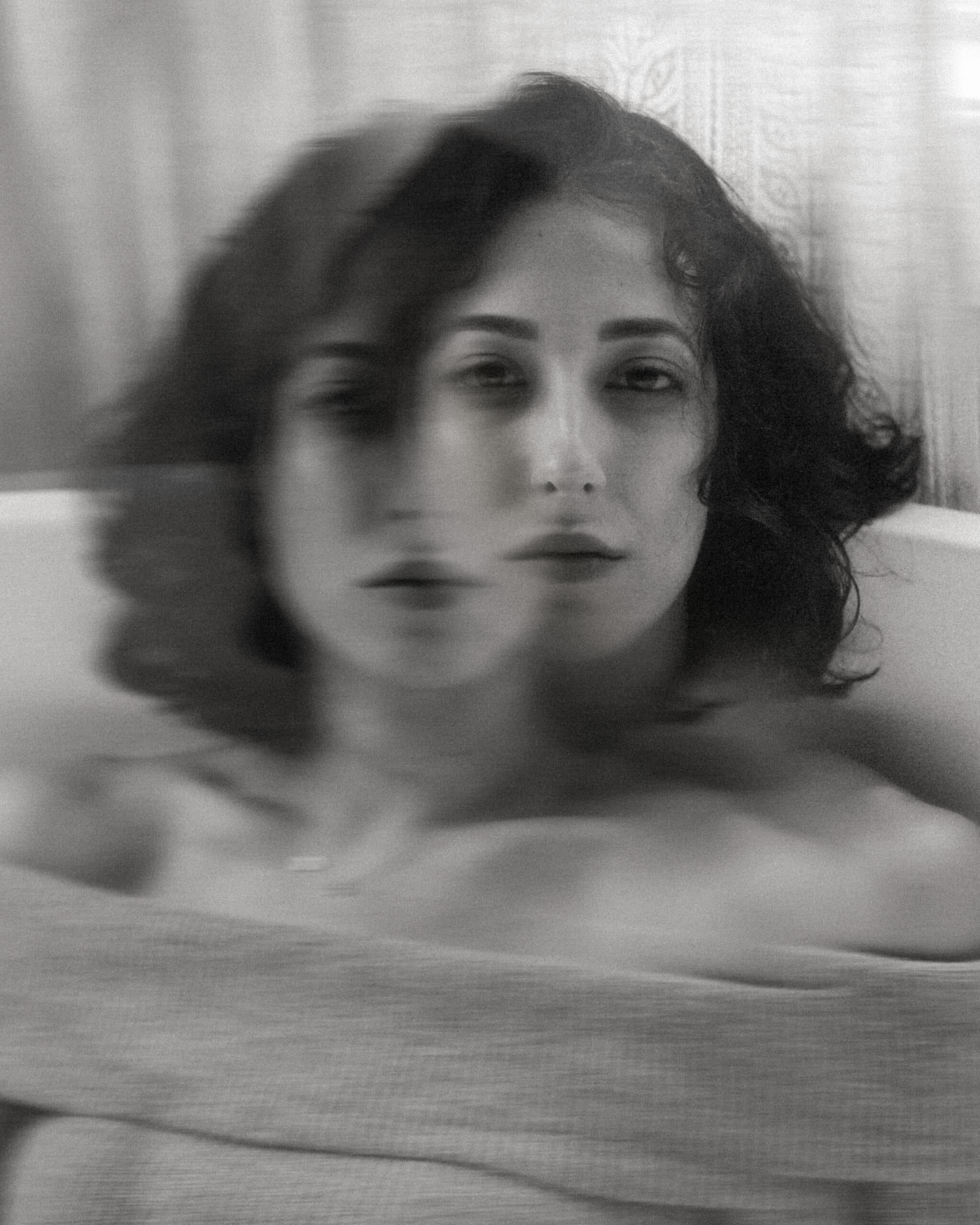 creative expression through echos of a blurry photo of a woman 