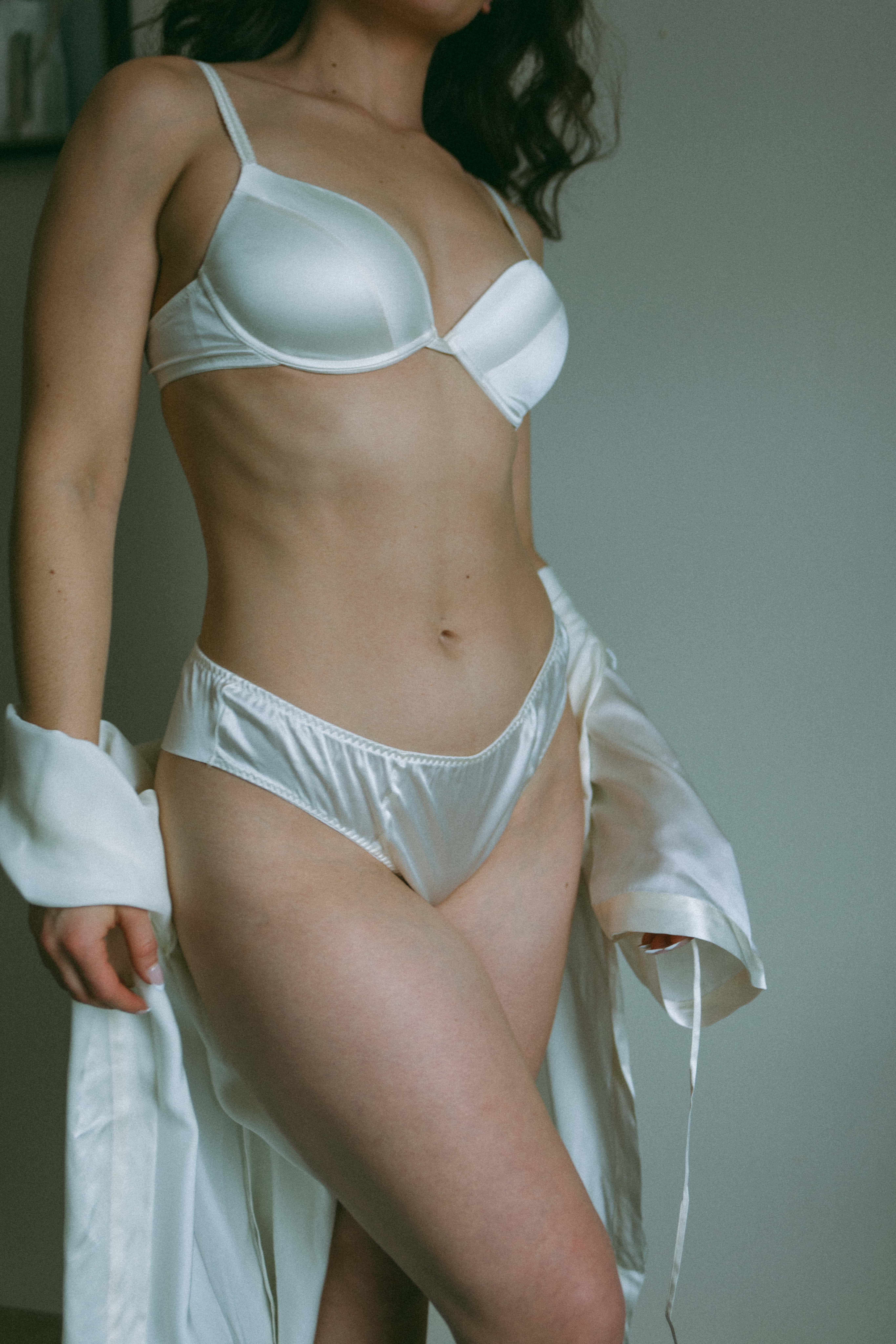 a woman's body in white lingerie showing what is a boudoir photoshoot